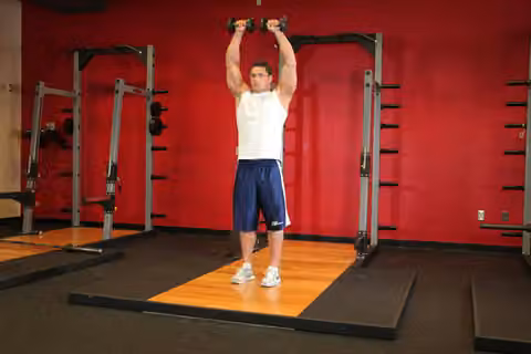Demonstrasi gerakan Standing Dumbbell Straight-Arm Front Delt Raise Above Head.